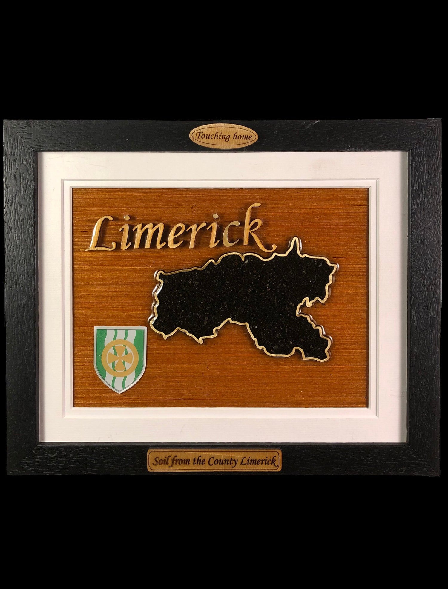 Wooden style plaque with the raised border effect of the 32 Counties of Ireland with the soil encased and displayed within